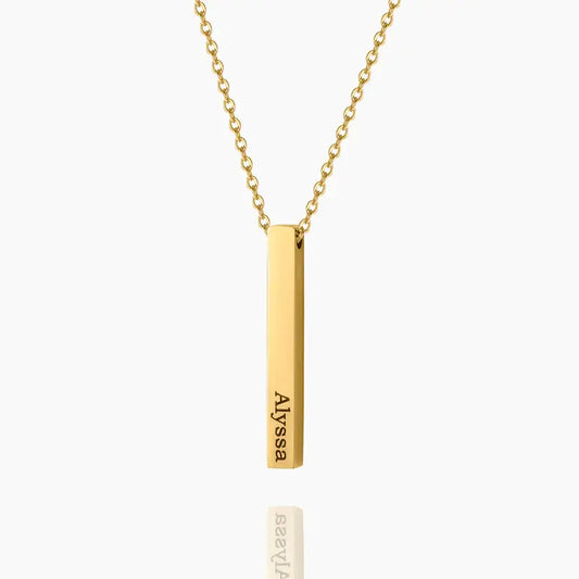 3D Bar Engraved Necklace by AUREATE featuring a gold bar pendant with the name Alyssa