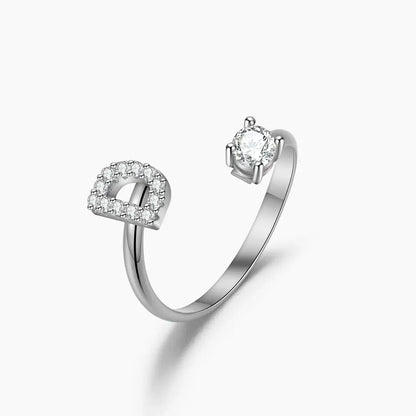 Iced Initial Signet Ring by AUREATE featuring a silver band with sparkling diamond accents.