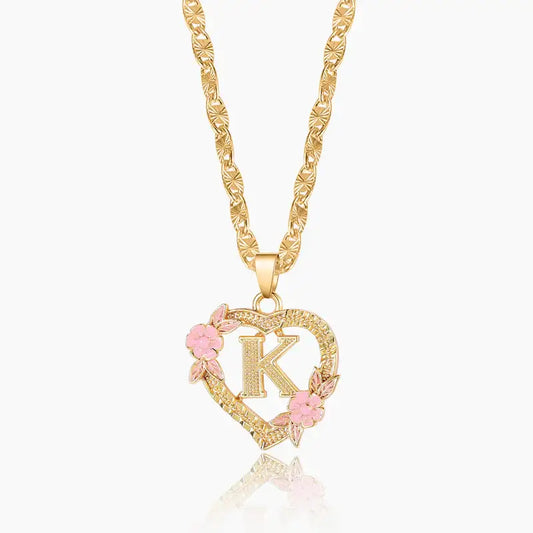 Floral Initial Necklace with Clip Chain by AUREATE featuring a gold heart pendant with 'K' and pink flowers.