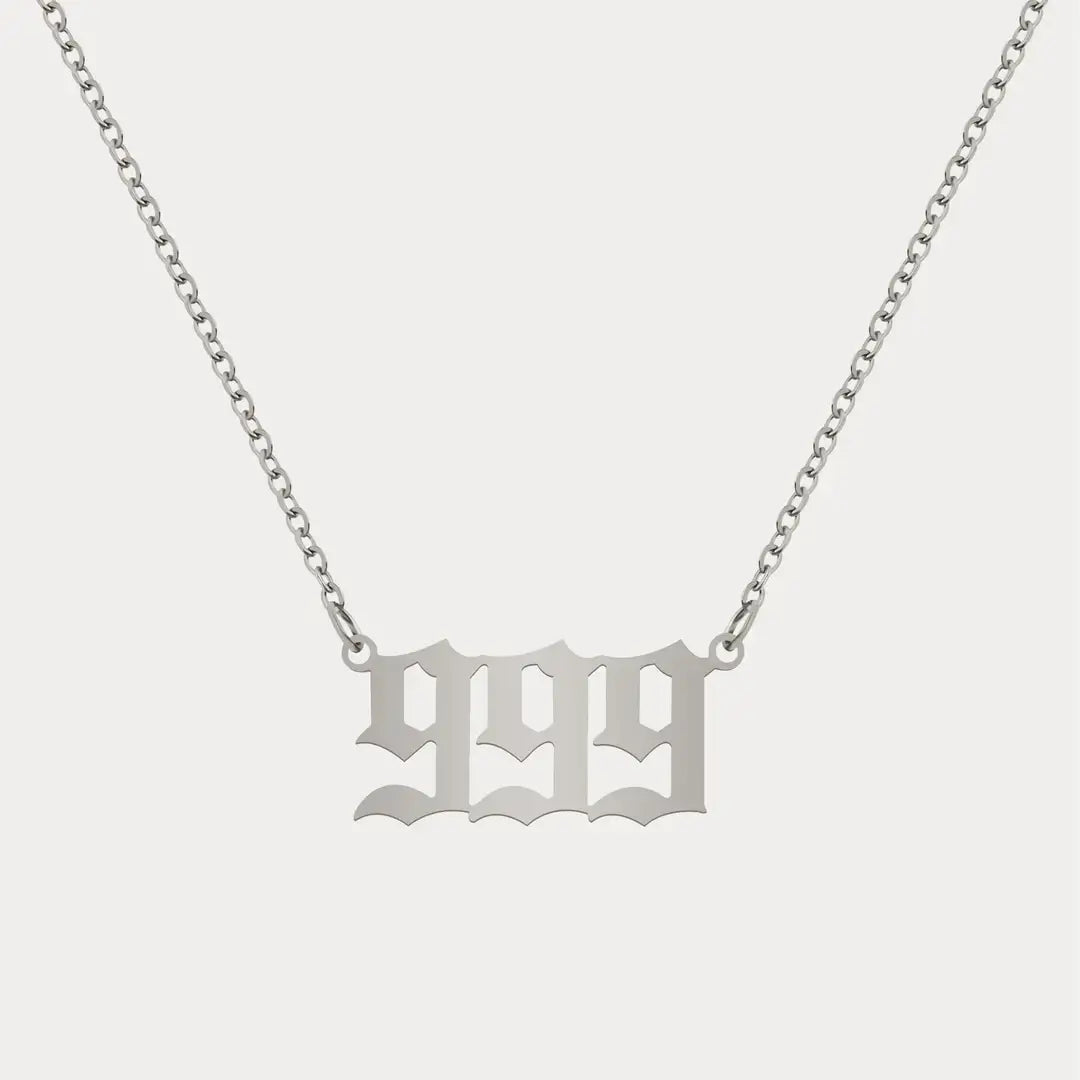 Angel Number Pendant Necklace by AUREATE, featuring a stylish silver '999' design on a delicate chain.