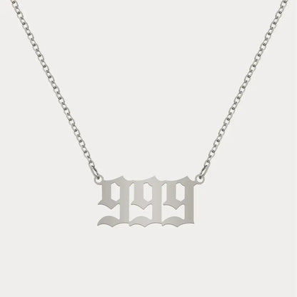Angel Number Pendant Necklace by AUREATE, featuring a stylish silver '999' design on a delicate chain.