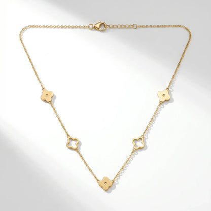 Four leaf clover necklace gold packshot white background 5 quatrefoil charms