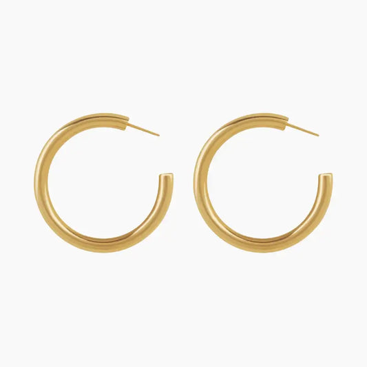 Chunky Hoop Earrings by AUREATE in premium 18K gold plating, embodying the UK's Sculptural Gold movement.