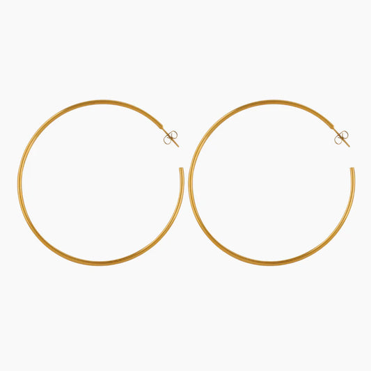 Classic Hoop Earrings by AUREATE in high-shine gold, showcasing bold versatility in 2026 fashion.