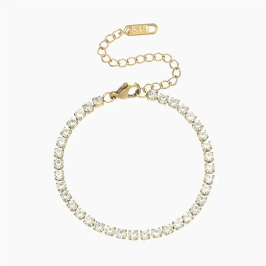 Classic Tennis Bracelet by AUREATE featuring a stunning gold chain and sparkling stones, ideal for timeless luxury and investment style.
