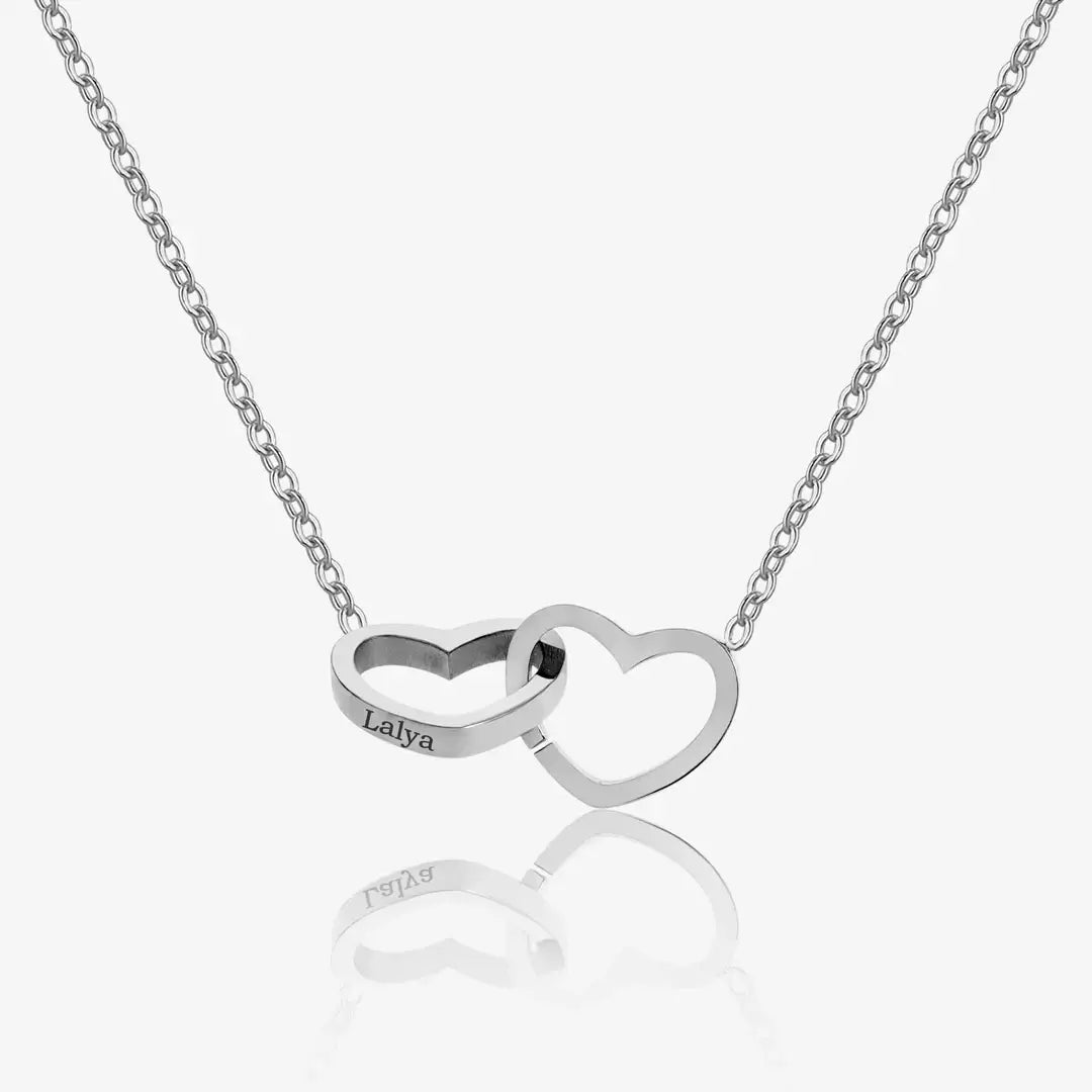 Double Heart Necklace with Engraving by AUREATE, showcasing interconnected heart motifs.