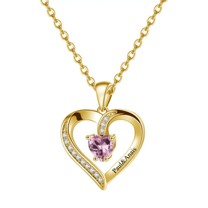 Aureate Heart Birthstone Necklace featuring a heart-shaped pendant with pink gemstone and sparkling accents.