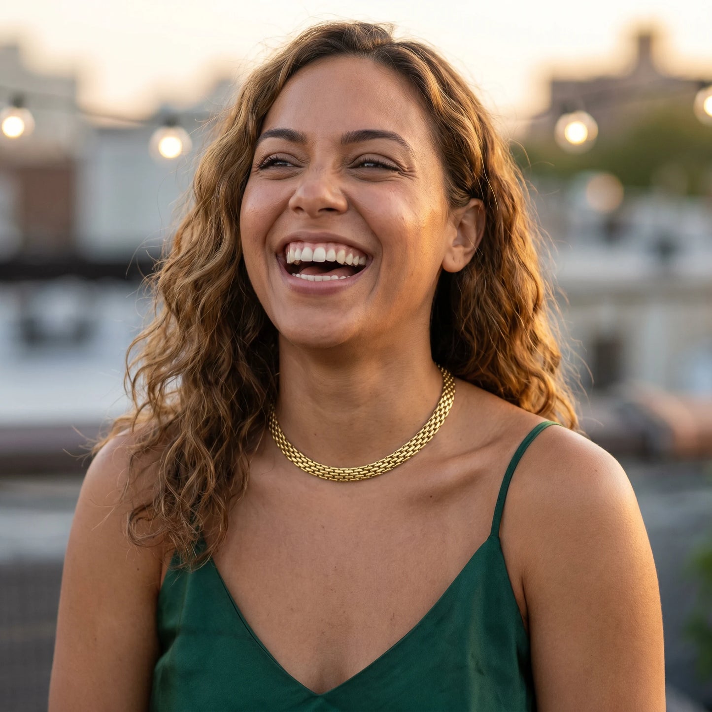 Mesh chain necklace gold joy laugh Brooklyn rooftop golden hour