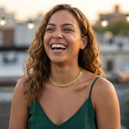 Mesh chain necklace gold joy laugh Brooklyn rooftop golden hour