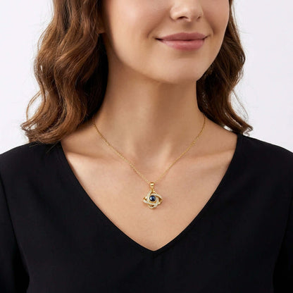 Photo Projection Necklace by AUREATE worn by a woman, showcasing its unique design and craftsmanship.