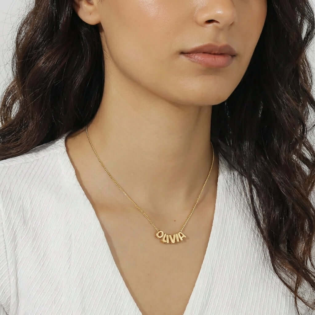 Sleek Vertical Personalised Necklace by AUREATE featuring the name OLIVIA, perfect for a modern signature look.