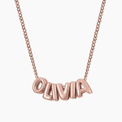 Bubble Style Name Necklace by AUREATE featuring the name 'OLIVIA' in playful, puffy text design.