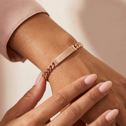 Cuban Bar Engraved Bracelet Rose Gold worn close-up at wrist Selena