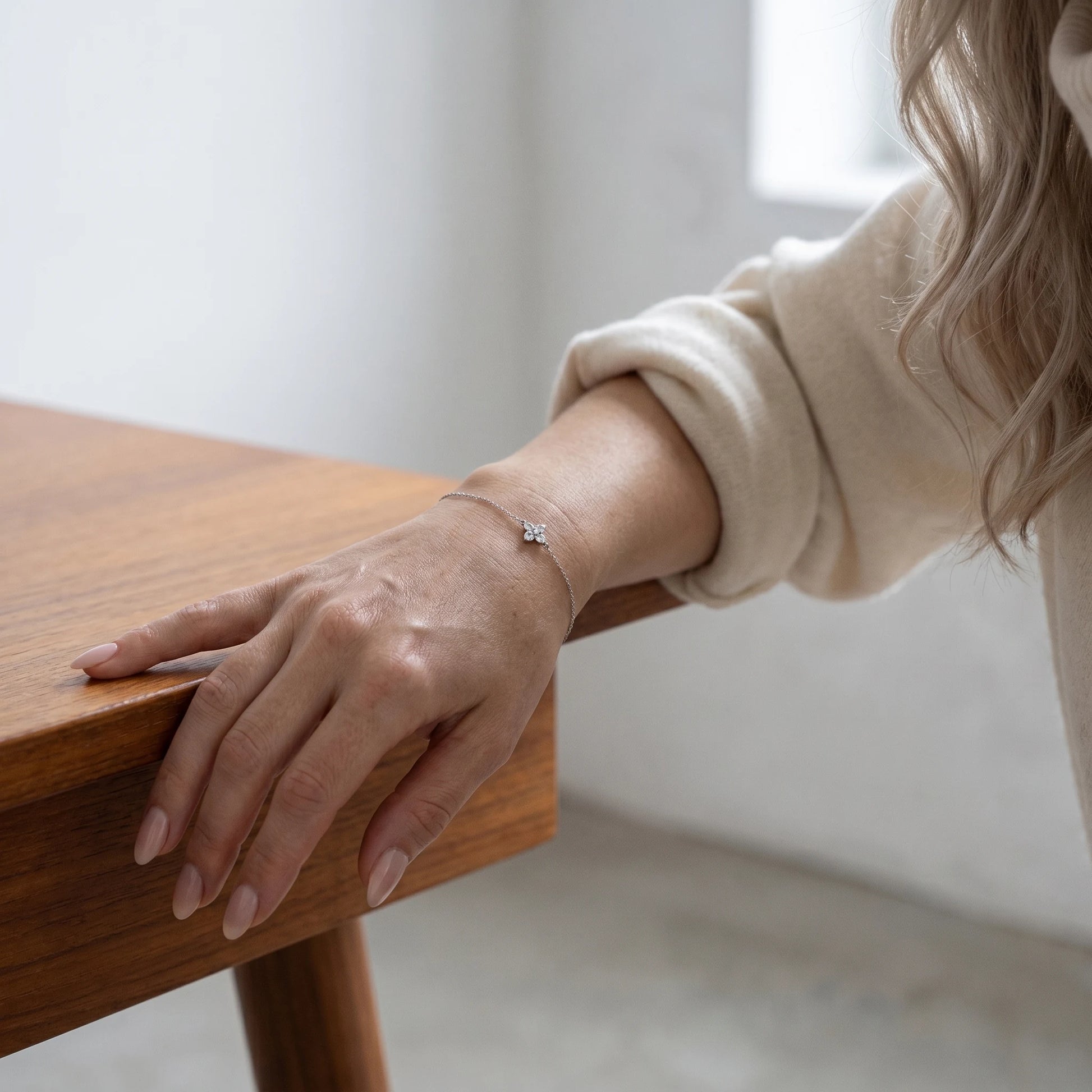 Silver clover bracelet mature Scandinavian elegant 3/4 portrait Nordic