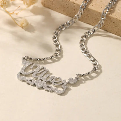 Diamond Cut Heart Name Necklace by AUREATE featuring a personalized nameplate design with diamond-cut texture.