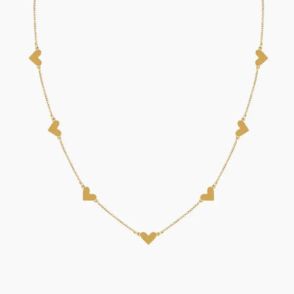 AUREATE Double Heart Necklace featuring interconnected heart motifs in a stylish gold design, symbolizing unity and connection.