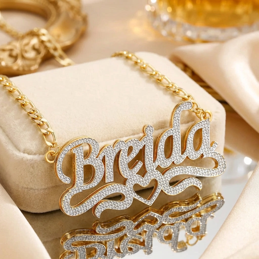 Double Plated Heart Title Name Necklace with Figaro Chain by AUREATE, featuring sparkling name design in gold.
