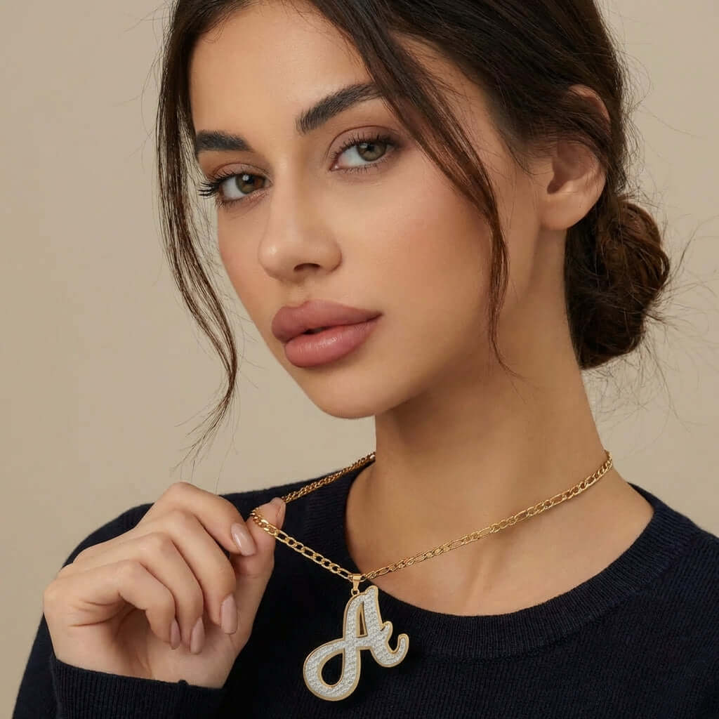Double Plated Initial Necklace with Figaro Chain by AUREATE worn by model, showcasing a stylish design.
