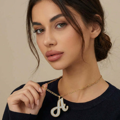 Double Plated Initial Necklace with Figaro Chain by AUREATE worn by model, showcasing a stylish design.