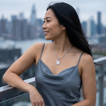 Raised Initial Figaro Pendant silver subtle smile profile NYC rooftop