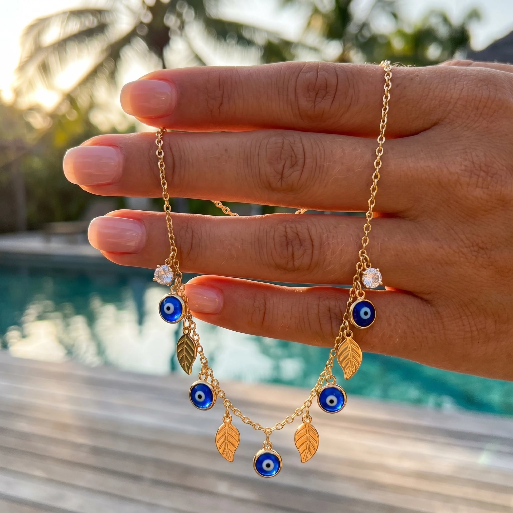 Evil Eye Leaf Anklet handheld inverted-V drape tropical poolside