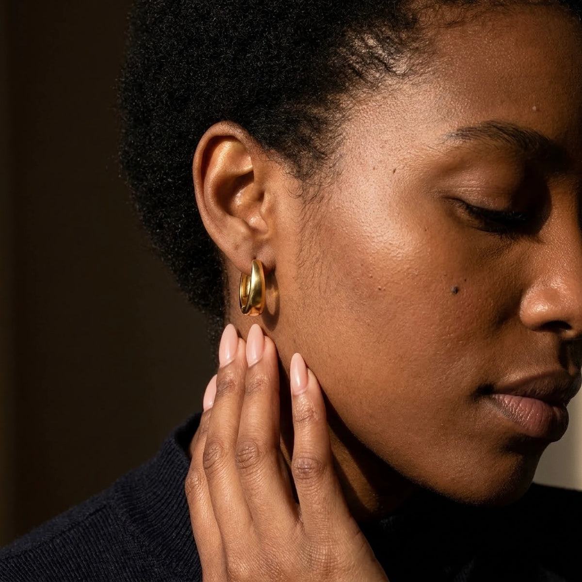 18K gold plated chunky dome hoop earrings, worn, close detail in warm light | SKU: AUR-CHKDOM-G