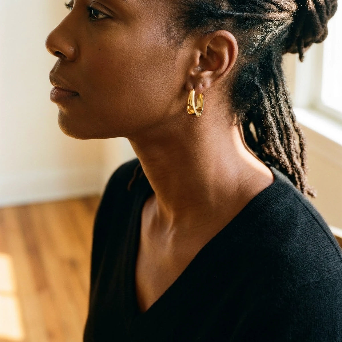 18K gold plated chunky dome hoop earrings, worn, three quarter view | SKU: AUR-CHKDOM-G