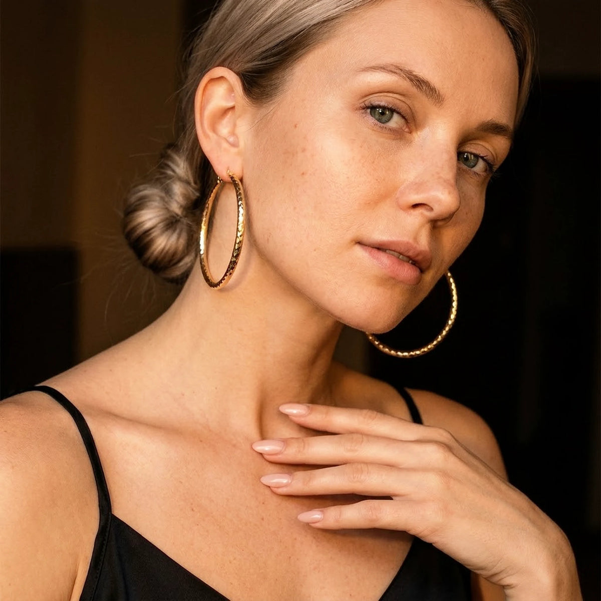 18K gold plated diamond cut large hoop earrings, worn, close portrait | SKU: AUR-DCTHOP-G