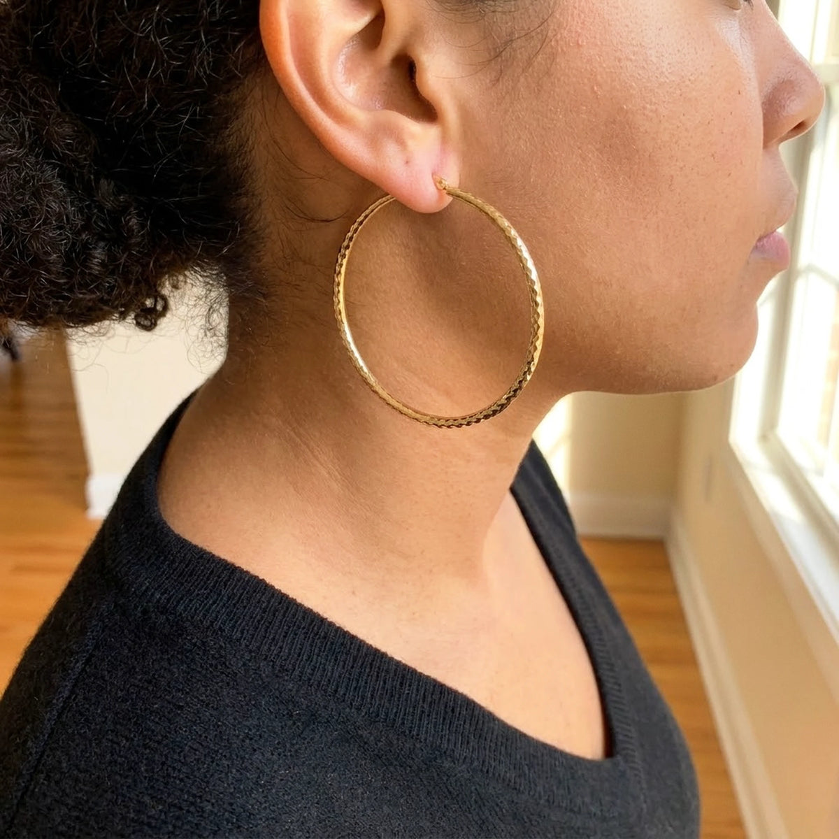 18K gold plated diamond cut large hoop earrings, worn, three quarter view | SKU: AUR-DCTHOP-G