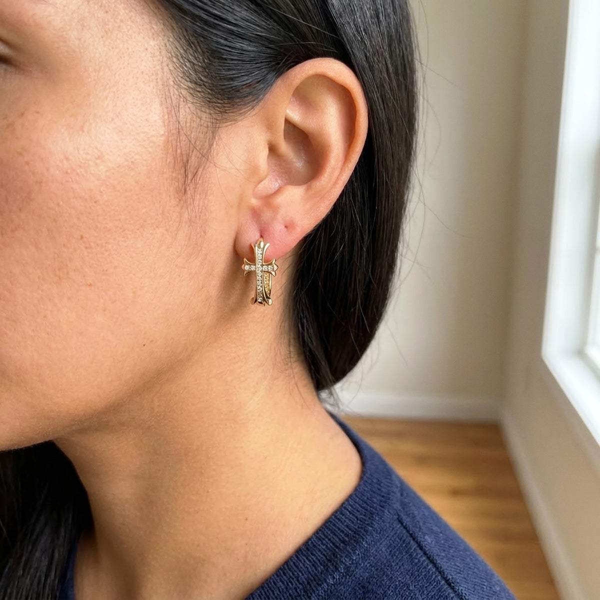 18K gold plated pave cross huggie hoop earrings, worn, three quarter view | SKU: AUR-CRXHUG-G