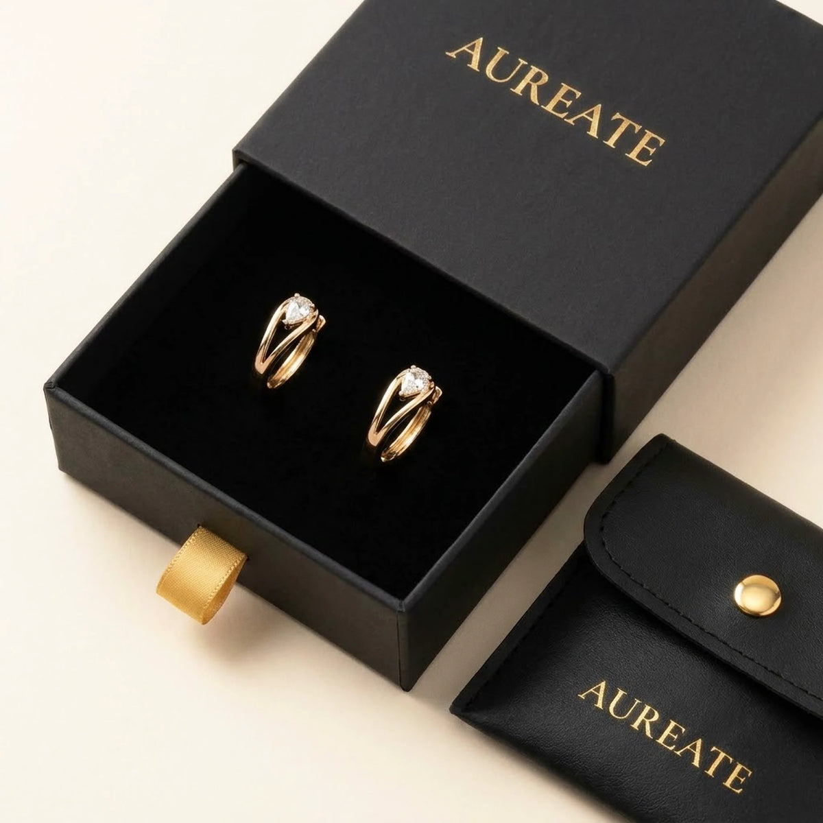 18K gold plated pear cut crystal huggie hoop earrings, in its gift box | SKU: AUR-PRCZHG-G