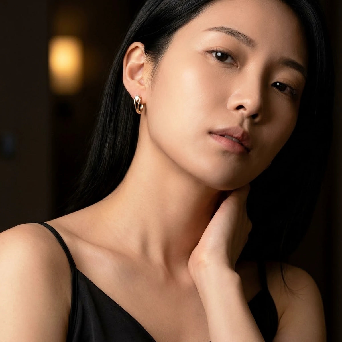 18K gold plated pear cut crystal huggie hoop earrings, worn, close portrait | SKU: AUR-PRCZHG-G