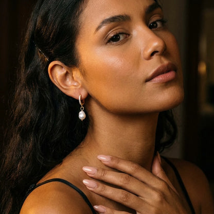 18K gold plated freshwater pearl drop huggie earrings, worn, close portrait | SKU: AUR-PRLHUG-G