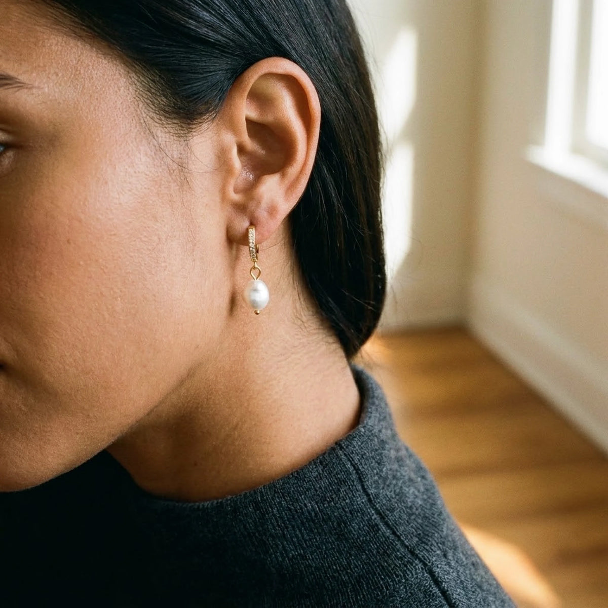 18K gold plated freshwater pearl drop huggie earrings, worn, three quarter view | SKU: AUR-PRLHUG-G
