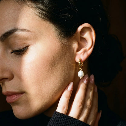 18K gold plated twisted rope pearl drop hoop earrings, worn, close detail in warm light | SKU: AUR-TWPRLH-G