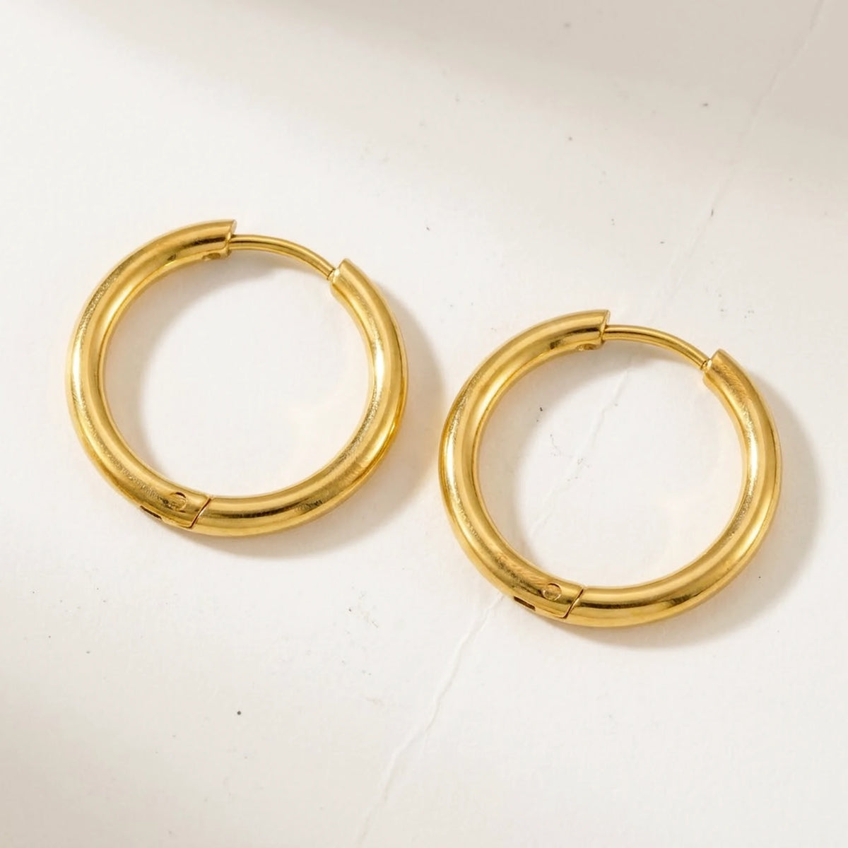 18K gold plated waterproof hoop earrings, product shot on white | SKU: AUR-CLSHOP-G