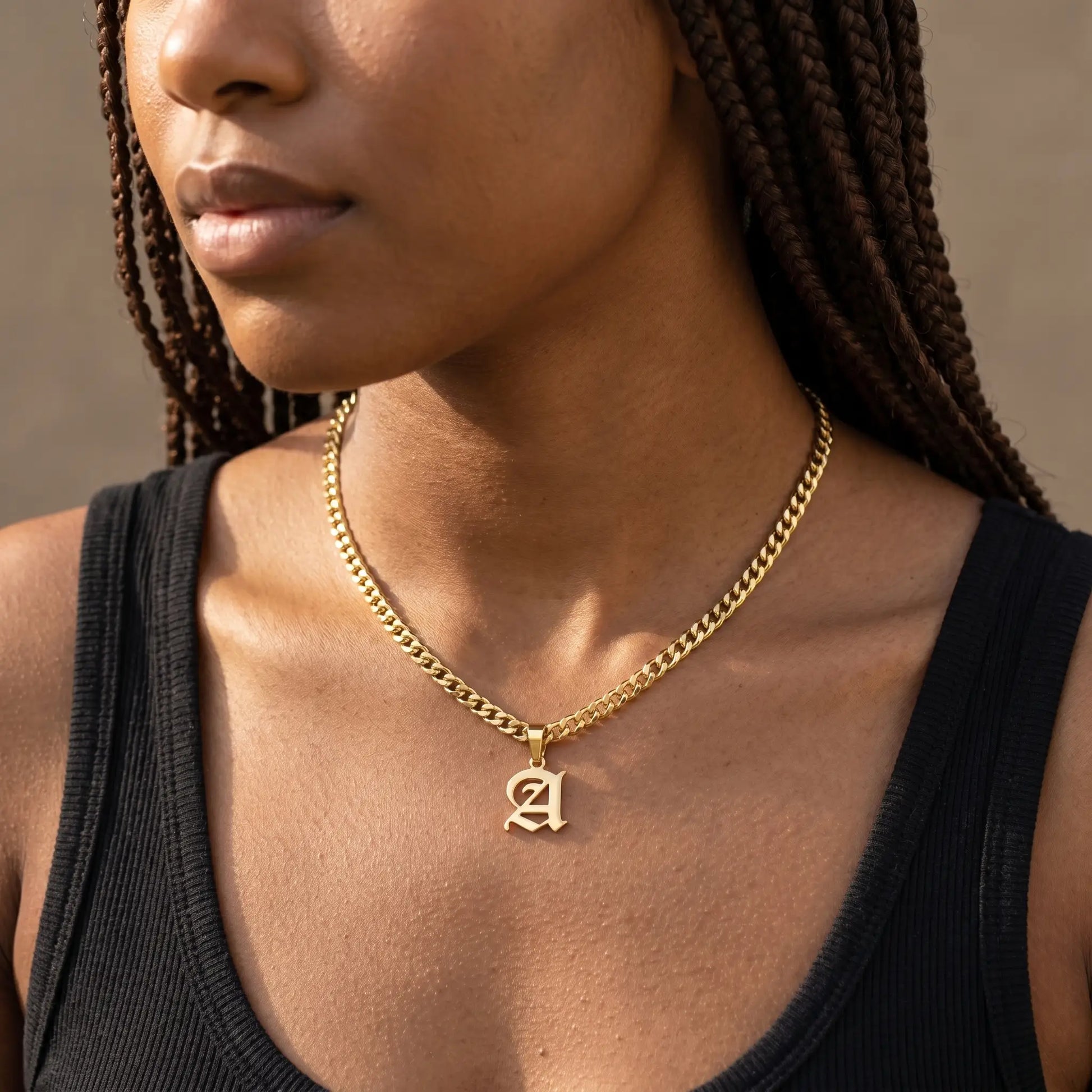 Gothic Initial Cuban Link Gold studio worn close-up A