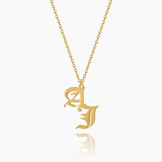 Gothic Two-Letter Necklace by AUREATE featuring gold Old English initials AJ, perfect for Gothic Romance style.