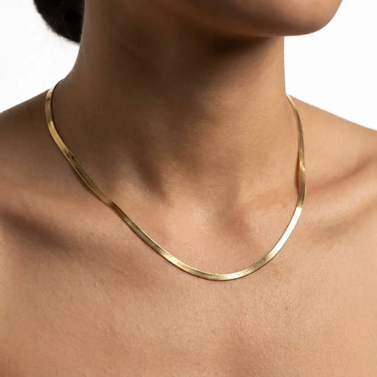 3mm Herringbone Gold Chain on neck studio featured