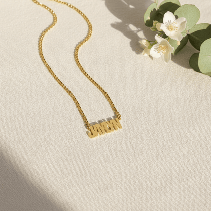Block Name Necklace with Cuban Chain featuring personalized gold name design by AUREATE.