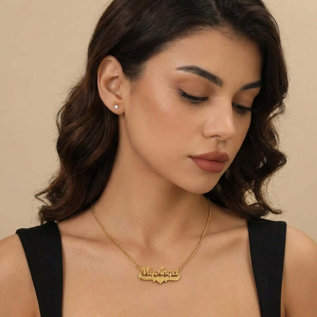 Double Plated Heart Name Necklace with Cuban Chain worn by model, showcasing elegant design from AUREATE.