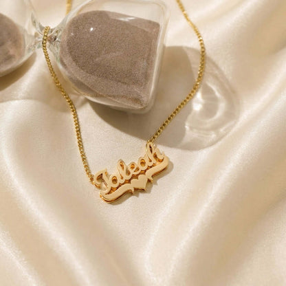 Double Plated Heart Name Necklace with Cuban Chain by AUREATE, featuring a personalized golden nameplate.