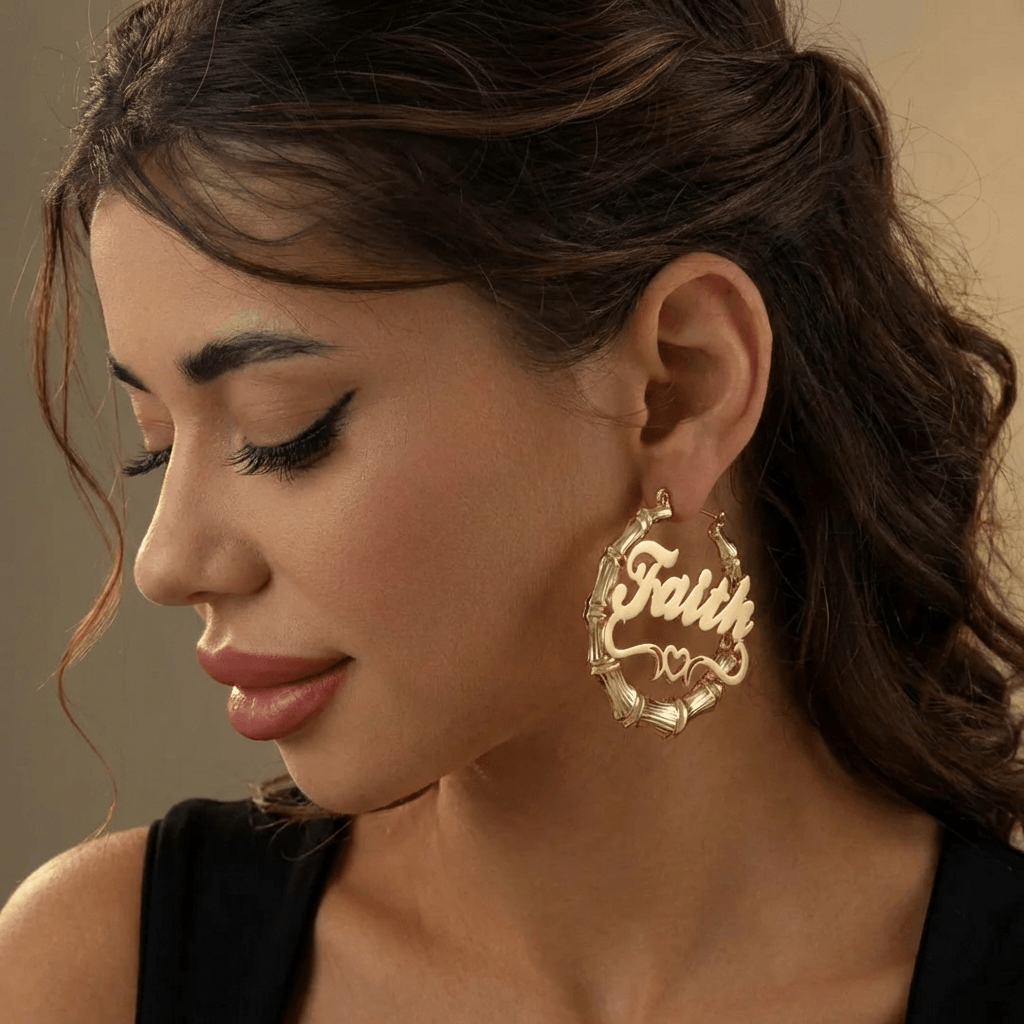 Bamboo Hoop Earrings with Heart Name featuring the word 'Faith' in a stylish design by AUREATE.