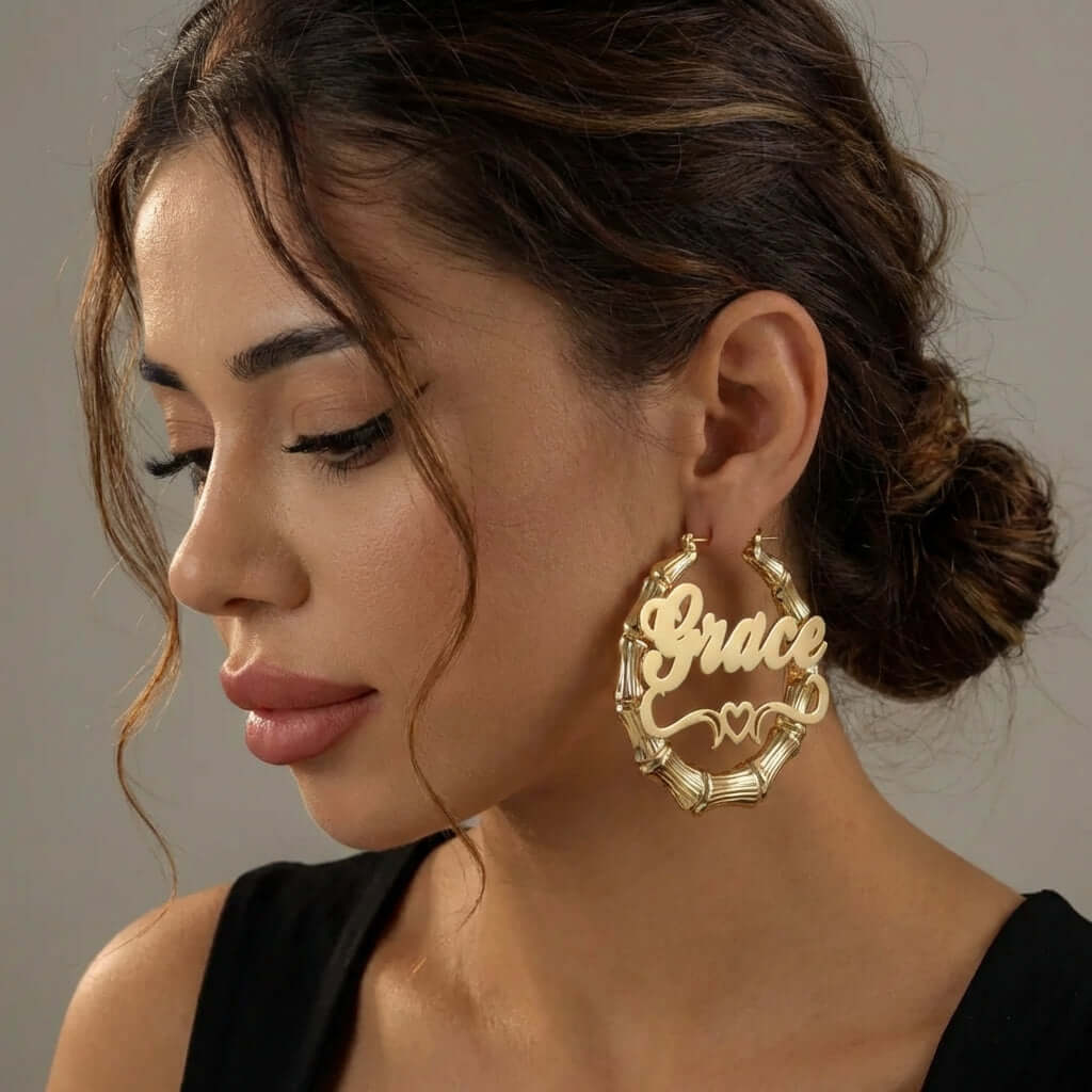 Bamboo Hoop Earrings with Heart Name showcased by AUREATE, featuring a personalized nameplate "Grace" in gold.
