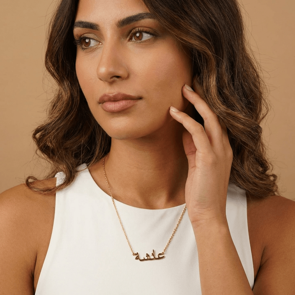 AUREATE Arabic Style Name Necklace worn by a woman, featuring personalized Arabic script.