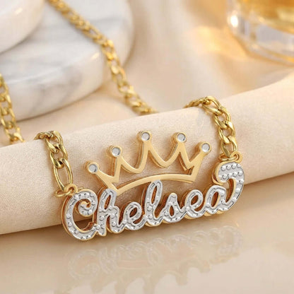 Double Plated Crown Name Necklace with Figaro Chain by AUREATE, featuring a crown design with the name Chelsea.