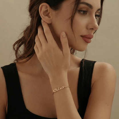 AUREATE Name Bracelet with Cuban Chain worn by a woman, showcasing personalized jewellery style.