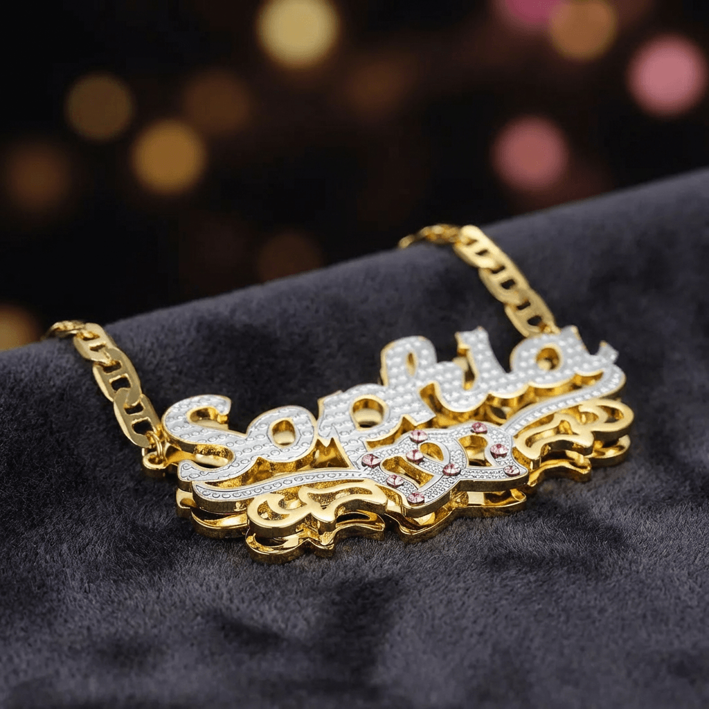 Double Heart Name Necklace with Clip Chain by AUREATE, featuring intertwined hearts and a gold chain design.