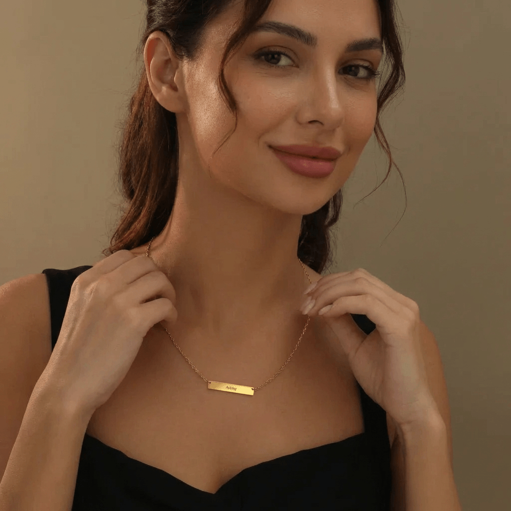 Bar Necklace with Engraving worn by a model, showcasing AUREATE's modern minimalist style.