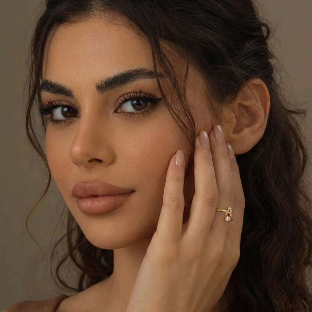 Iced Initial Signet Ring worn by model showcasing AUREATE brand's modern design and elegance.